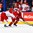 BUFFALO, NEW YORK - JANUARY 4: Denmark's Phillip Schultz #27 attempts to dispossess Belarus' Viktor Bovbel #7 of the puck during the relegation round of the 2018 IIHF World Junior Championship. (Photo by Andrea Cardin/HHOF-IIHF Images)

